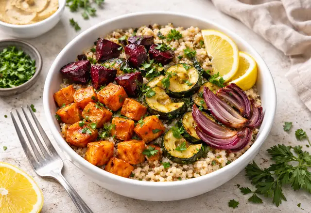 quinoa bowl topped with roasted vegetables